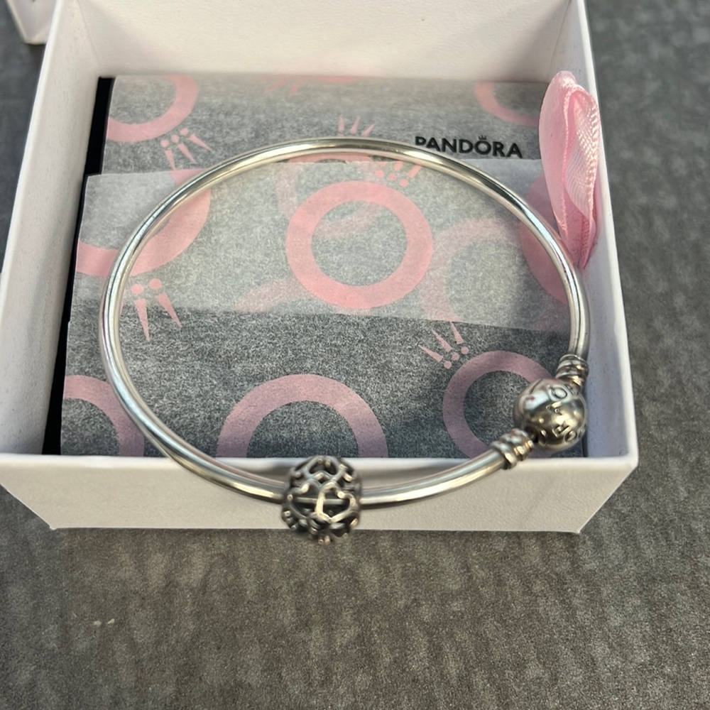 Pandora bangle with charm